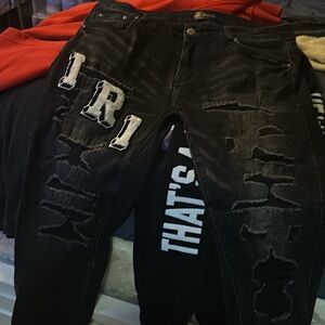 Amiri jeans Distressed Black Jeans with Lettering